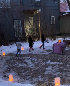 children walking on a winter labyrinth